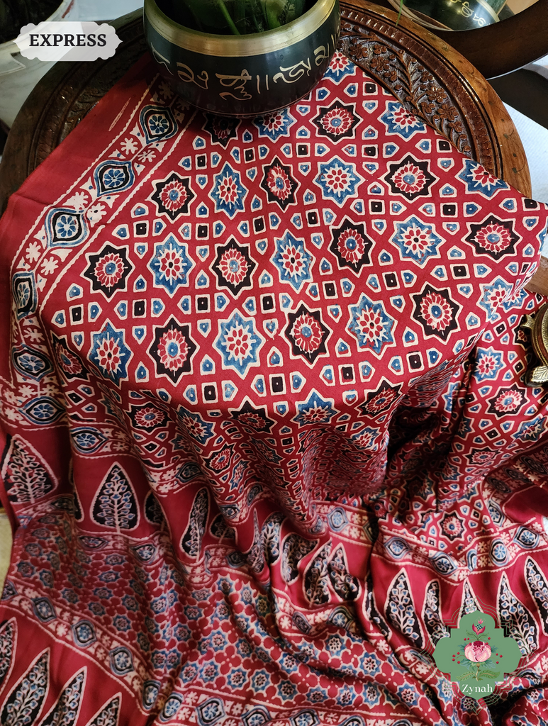 Madder Red Ajrakh Modal Silk Saree, Crafted Using The Traditional Method Of Hand Block Printing Using 100% Natural Dyes