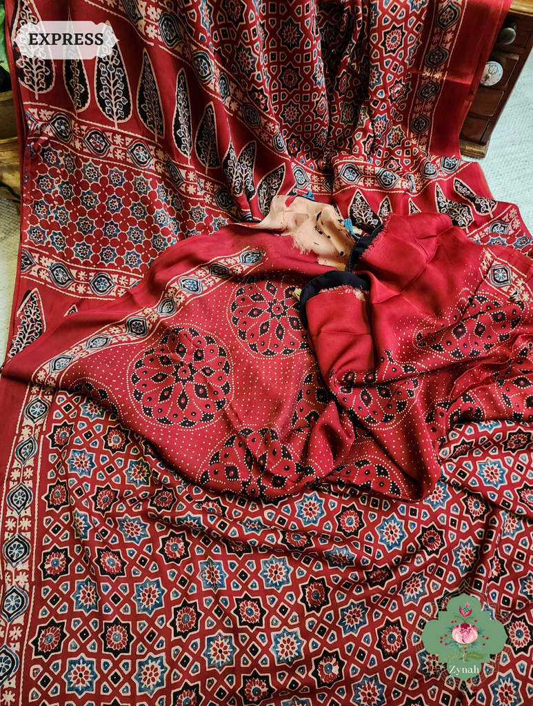 Madder Red Ajrakh Modal Silk Saree, Crafted Using The Traditional Method Of Hand Block Printing Using 100% Natural Dyes