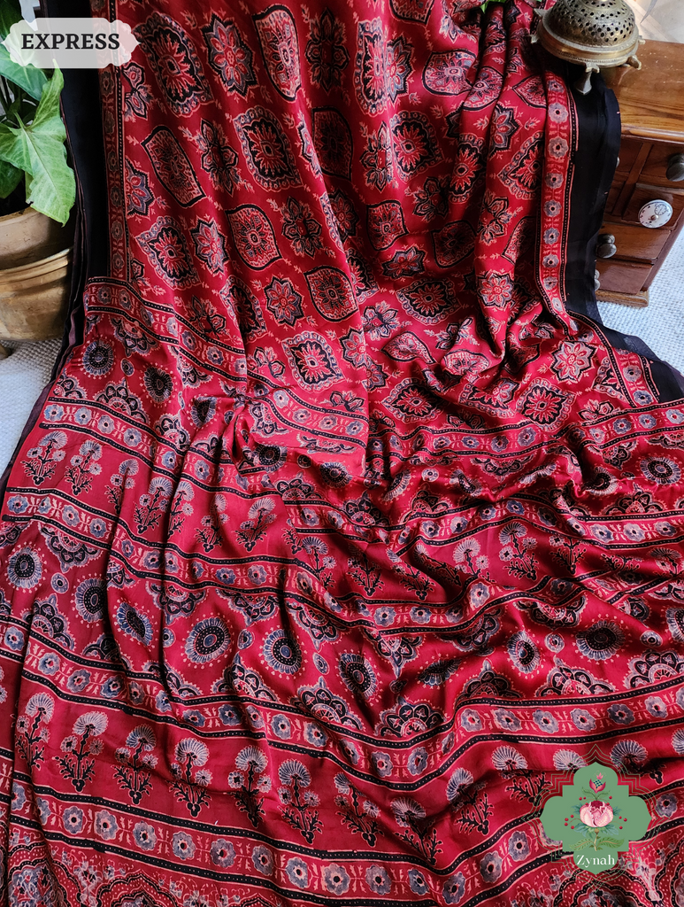 Madder Red Ajrakh Modal Silk Saree, Crafted Using The Traditional Method Of Hand Block Printing Using 100% Natural Dyes