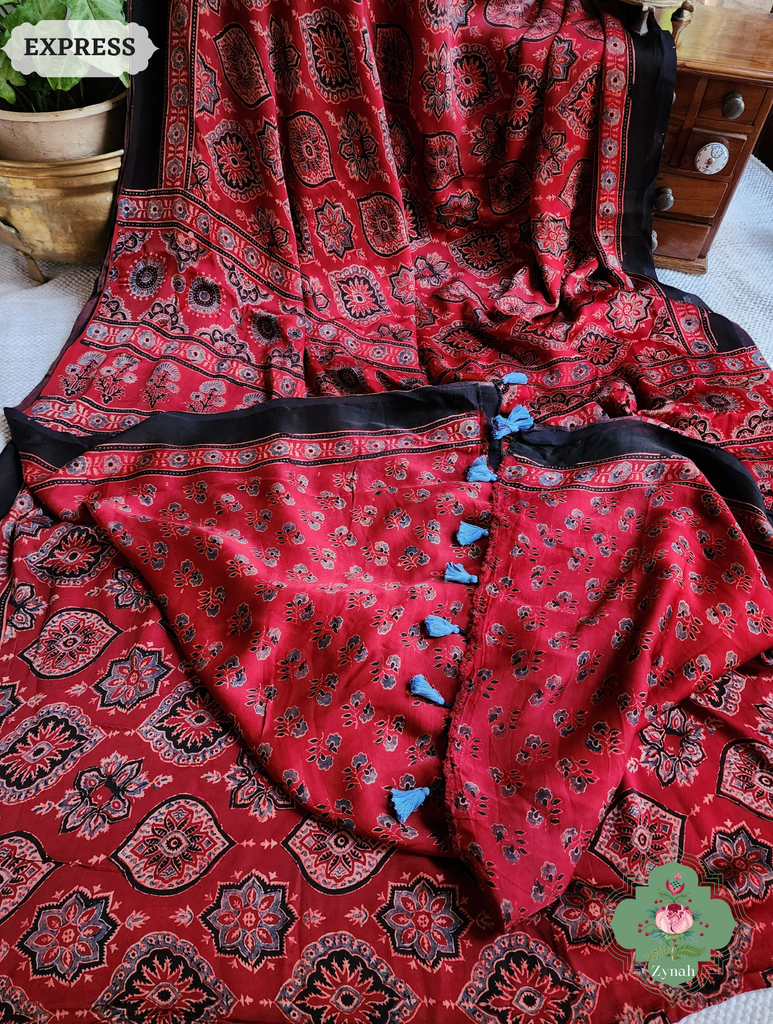 Madder Red Ajrakh Modal Silk Saree, Crafted Using The Traditional Method Of Hand Block Printing Using 100% Natural Dyes