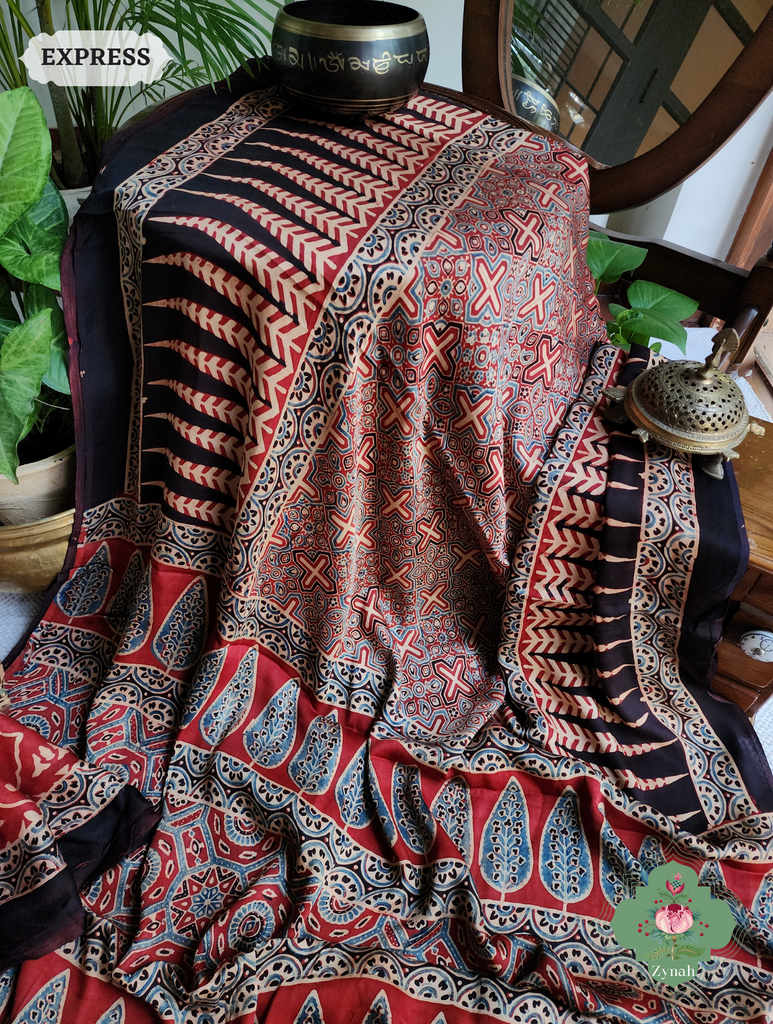Madder Red Ajrakh Modal Silk Saree, Crafted Using The Traditional Method Of Hand Block Printing Using 100% Natural Dyes