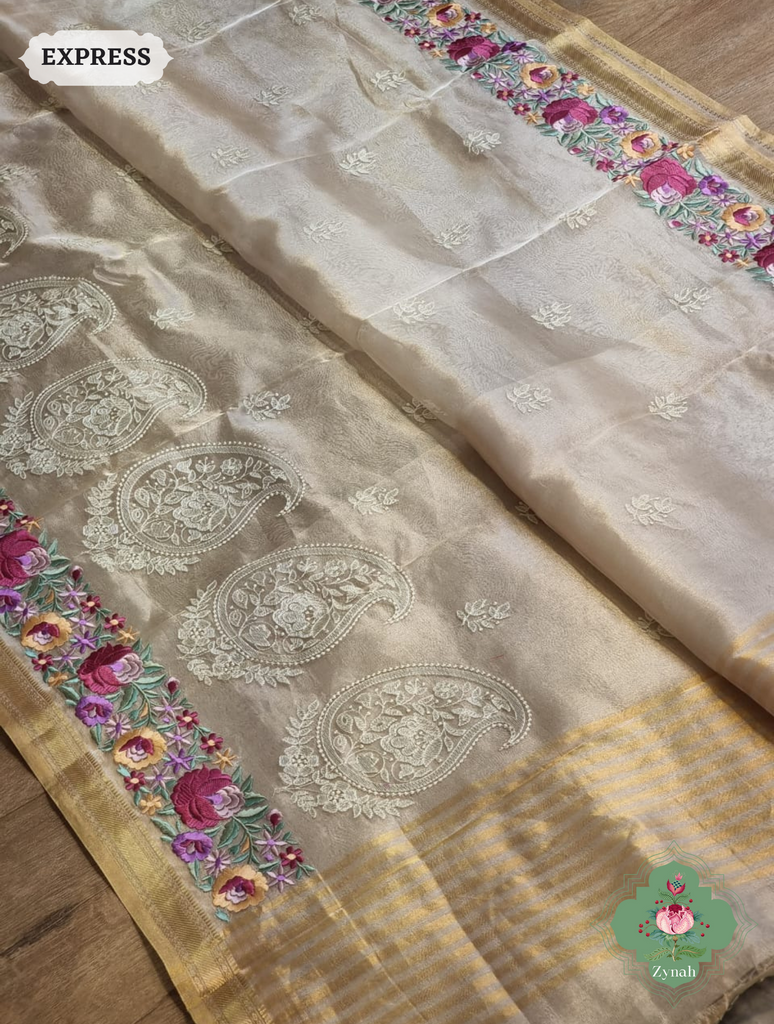 Off White Pure Tissue Silk Saree With Parsi Work & Chikankari Inspired Embroidery On The Border