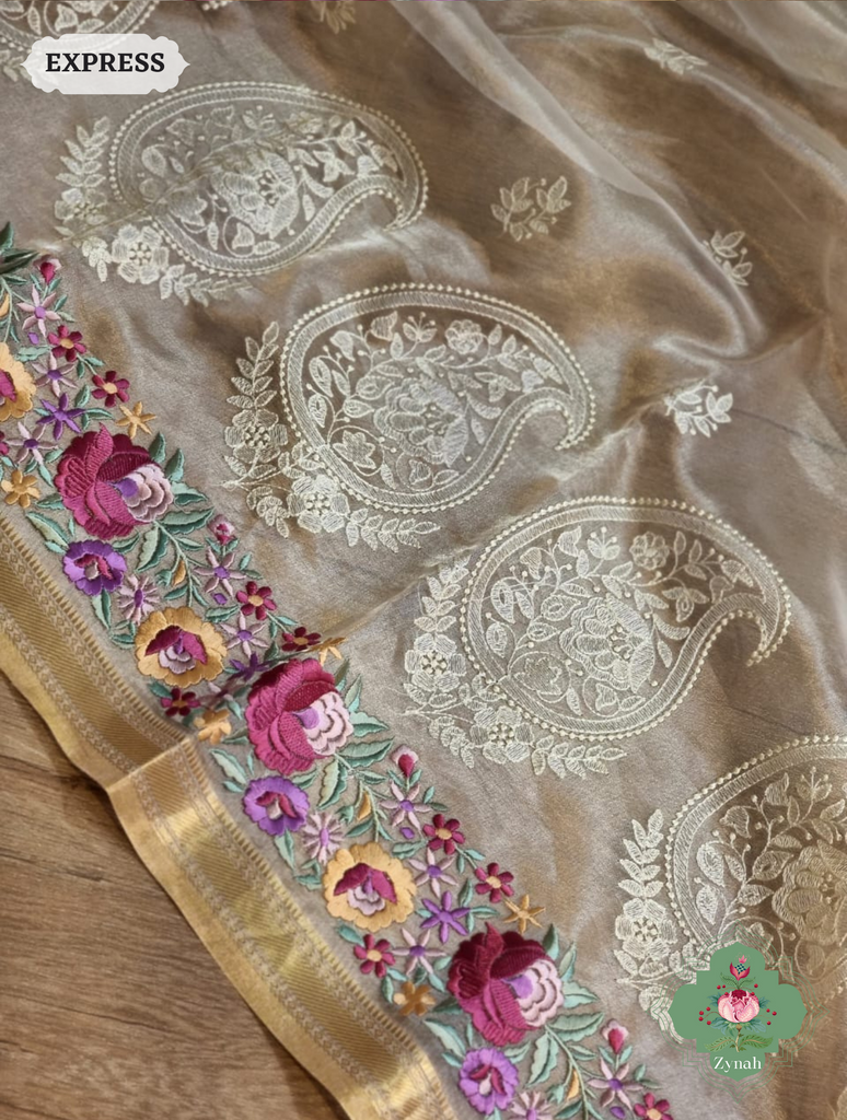 Off White Pure Tissue Silk Saree With Parsi Work & Chikankari Inspired Embroidery On The Border