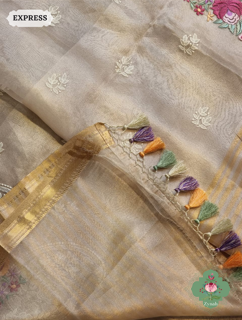 Off White Pure Tissue Silk Saree With Parsi Work & Chikankari Inspired Embroidery On The Border