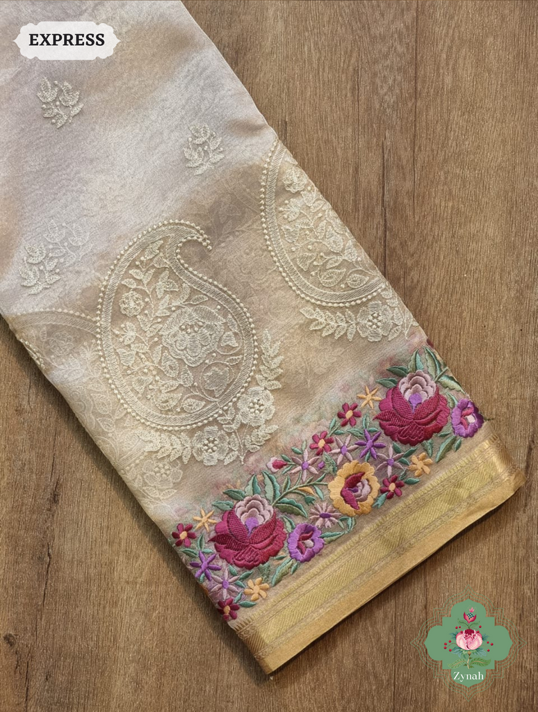 Off White Pure Tissue Silk Saree With Parsi Work & Chikankari Inspired Embroidery On The Border