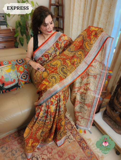 Zynah Beige & Red Organic Linen Saree With Kalamkari Print; Custom Stitched/Ready-made Blouse, Fall, Petticoat; SKU: 1006202302