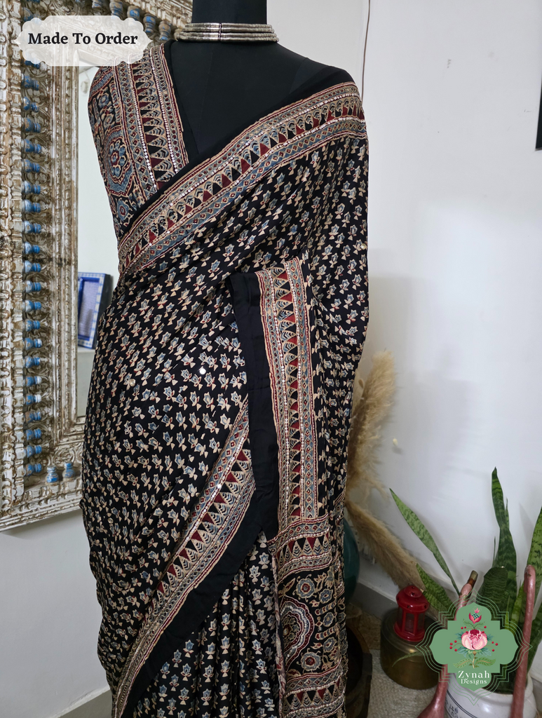 Zynah Made To Order Black Ajrakh Modal Silk Saree With Lagdi Patta Pallu & Hand Embellishments; Custom Stitched/Ready-made Blouse, Fall, Petticoat; SKU:1909202503