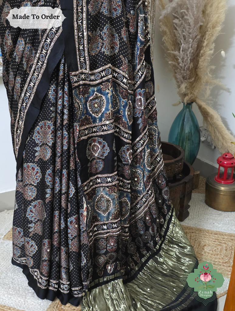 Zynah Made To Order Black Ajrakh Modal Silk Saree With Lagdi Patta Pallu & Hand Embellishments; Custom Stitched/Ready-made Blouse, Fall, Petticoat; SKU:1909202504
