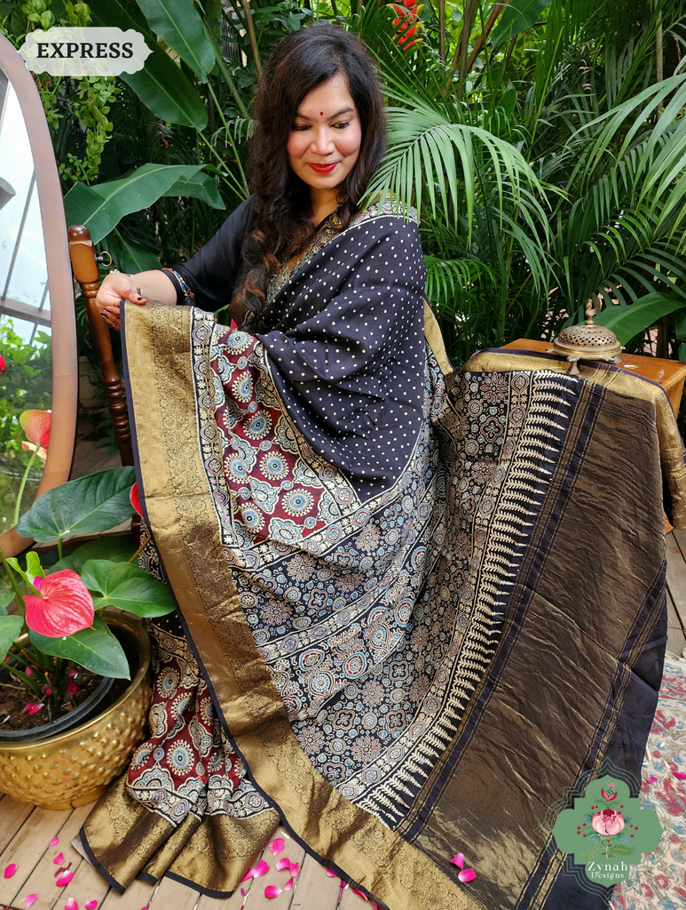 Zynah Black & Maroon Dola Silk Ajrakh Block Printed Saree With Zari Border; Custom Stitched/Ready-made Blouse, Fall, Petticoat; SKU: 1110202402