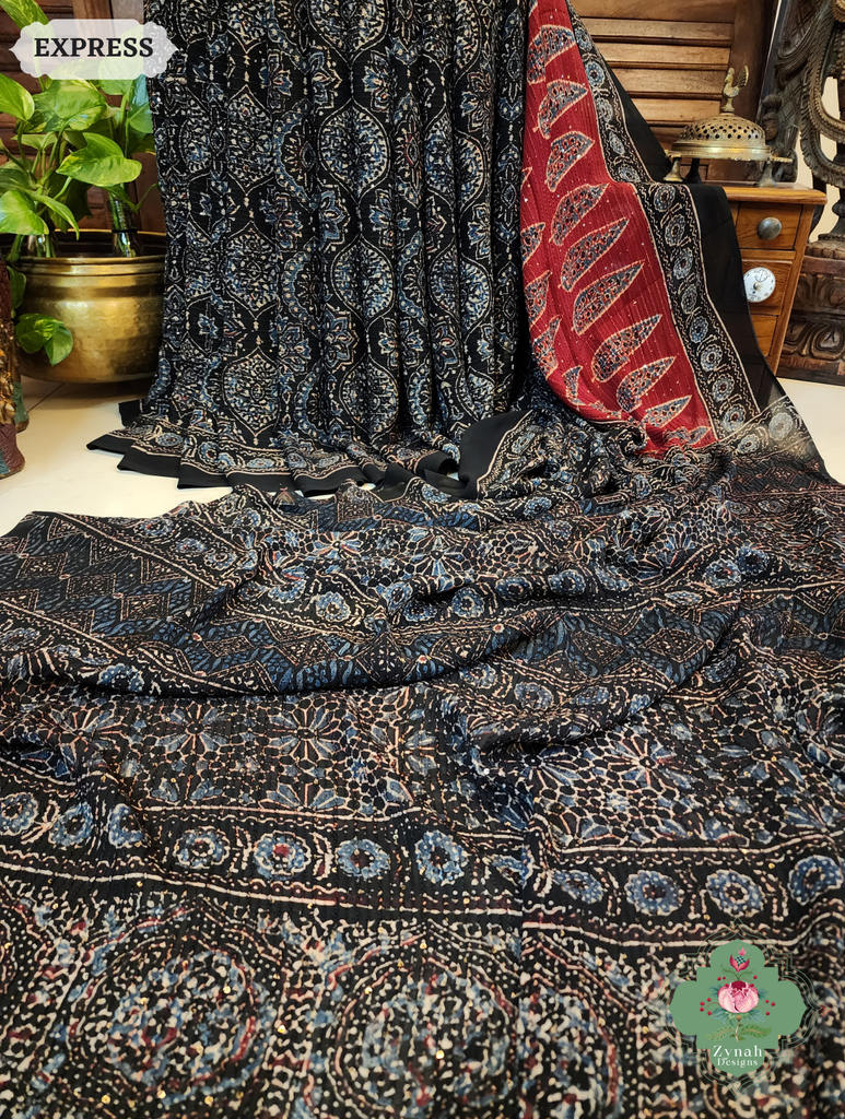 Zynah Black & Madder Red Hand-Block Printed Georgette Silk Ajrakh Saree with Sequins Highlight; Custom Stitched/Ready-made Blouse, Fall, Petticoat; SKU: 1004202502