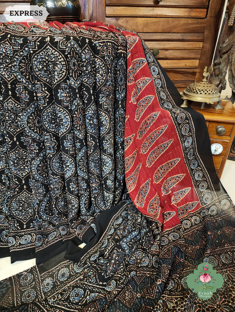 Zynah Black & Madder Red Hand-Block Printed Georgette Silk Ajrakh Saree with Sequins Highlight; Custom Stitched/Ready-made Blouse, Fall, Petticoat; SKU: 1004202502