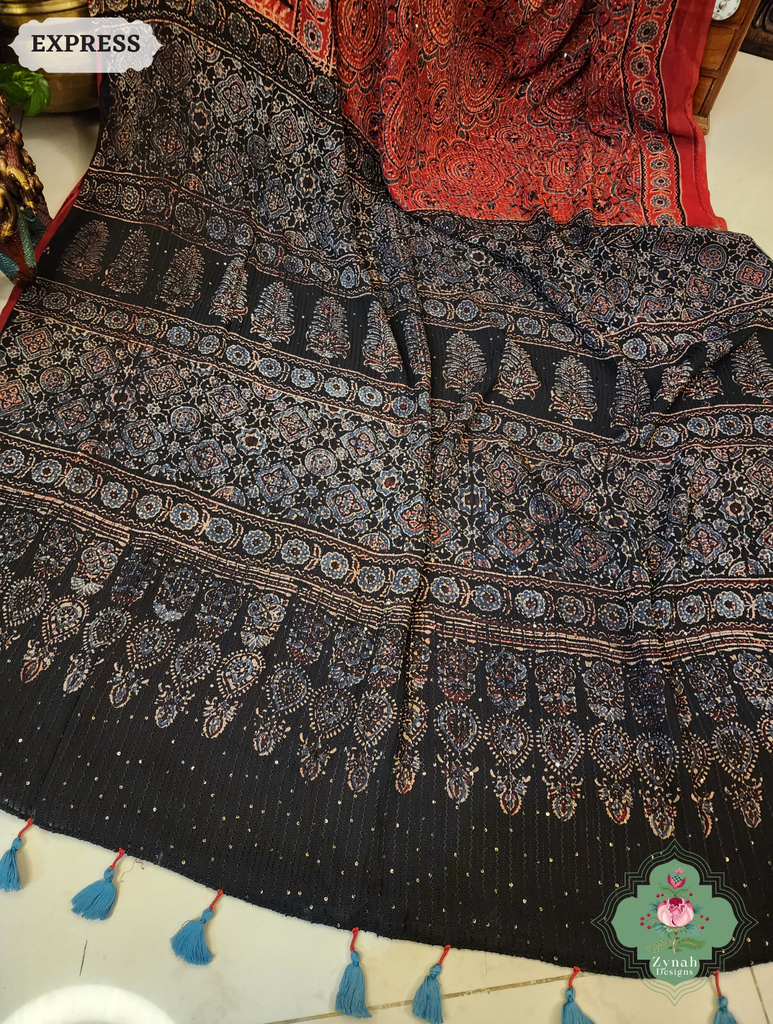 Zynah Black & Madder Red Hand-Block Printed Georgette Silk Ajrakh Saree with Sequins Highlight; Custom Stitched/Ready-made Blouse, Fall, Petticoat; SKU: 1004202502