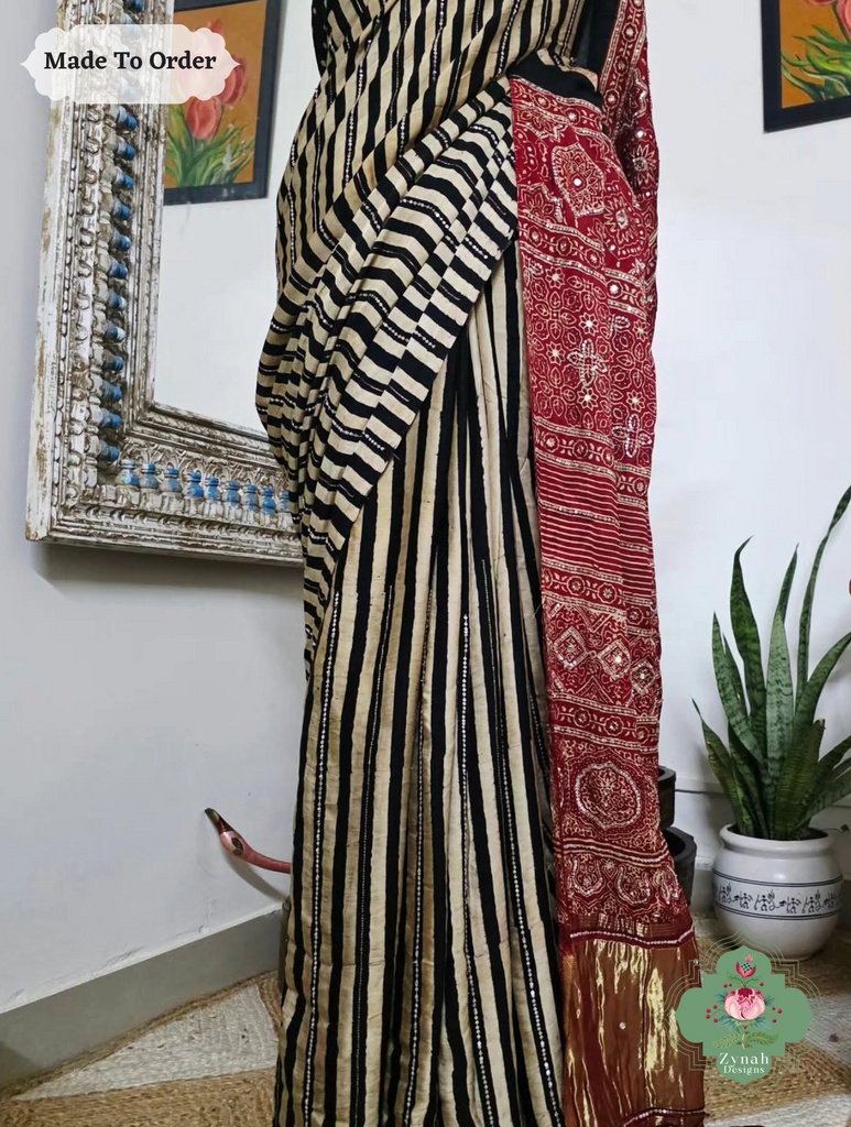 Zynah Made To Order Black & Madder Red Ajrakh Modal Silk Saree With Lagdi Patta Pallu & Hand Embellishments; Custom Stitched/Ready-made Blouse, Fall, Petticoat; SKU:1909202505