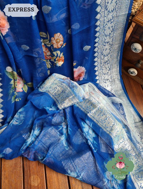 Zynah Blue Pure Khaddi Georgette Floral Banarasi Saree With Silver Zari; Custom Stitched/Ready-made Blouse, Fall, Petticoat; SKU: 2804202302