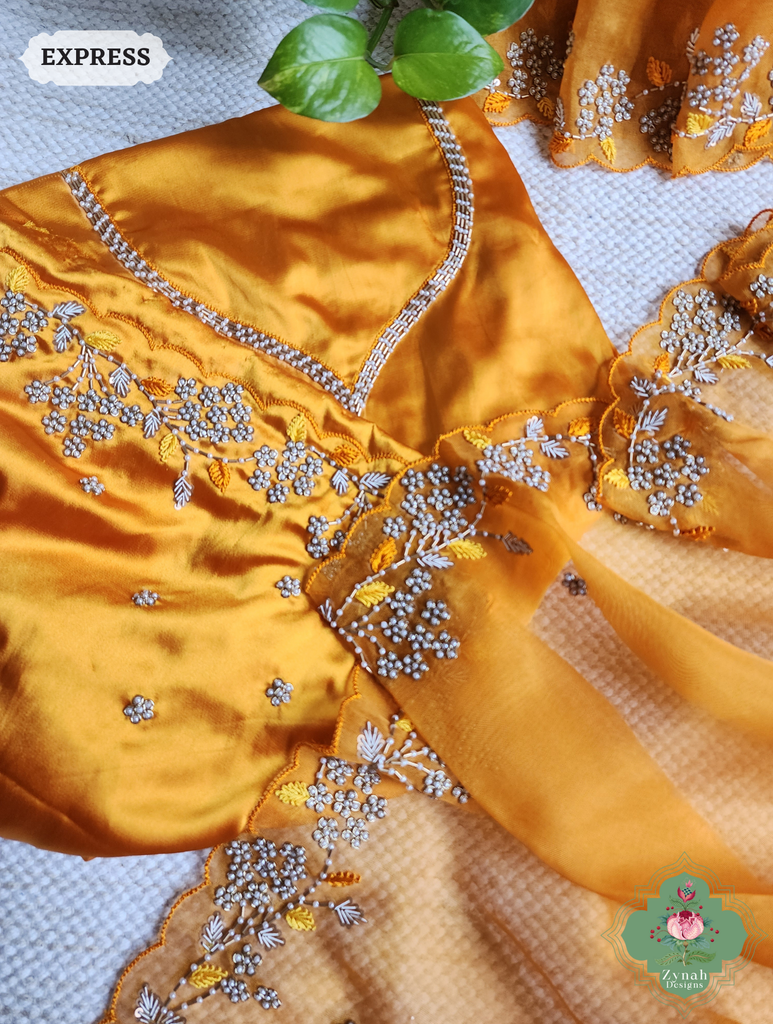Zynah Burnt Yellow Organza Silk Saree With Pearls & Sequins Hand Embellishments; Custom Stitched/Ready-made Blouse, Fall, Petticoat; SKU: 2711202401