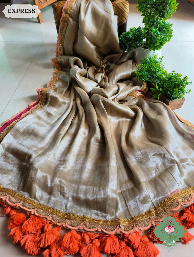 Zynah Metallic Champagne Gold Linen Tissue Saree With Scalloped Lace & Orange Tassels; Custom Stitched/Ready-made Blouse, Fall, Petticoat; SKU: 2703202505