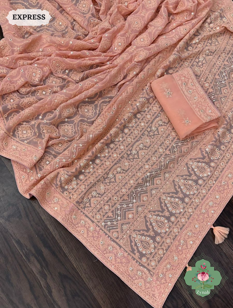 Pure Georgette Chikankari Saree With Foil Mirror Work - A perfect blend of elegance and glamour for special occasions.