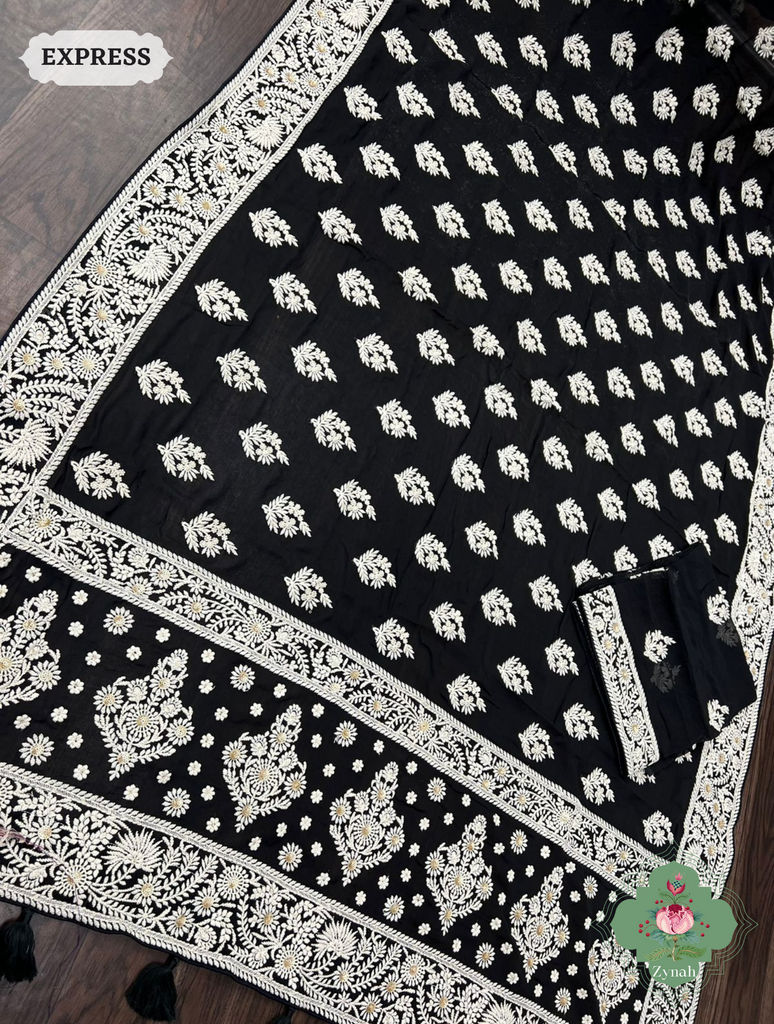 Pure Georgette Chikankari Saree - Timeless elegance with intricate butis and borders, perfect for any occasion.