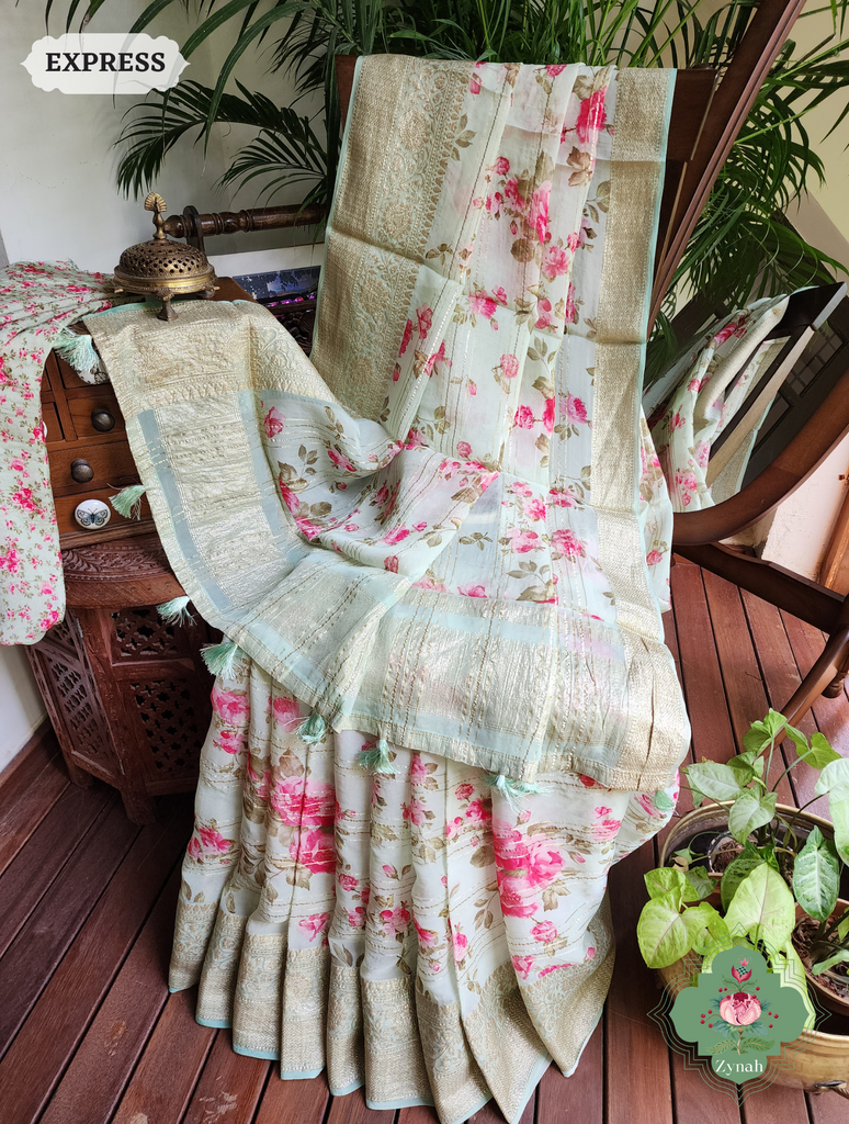 Pista Green Organza Satin Silk Saree: Timeless elegance in exquisite silk fabric with a touch of nature-inspired beauty.