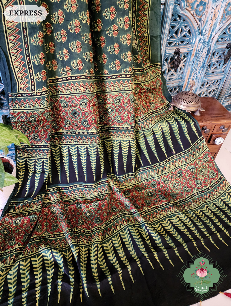 Zynah Green & Red Ajrakh Modal Silk Saree Crafted Using The Traditional Method Of Hand Block Printing Using 100% Natural Dyes; Custom Stitched/Ready-made Blouse, Fall, Petticoat; SKU: 1402202504