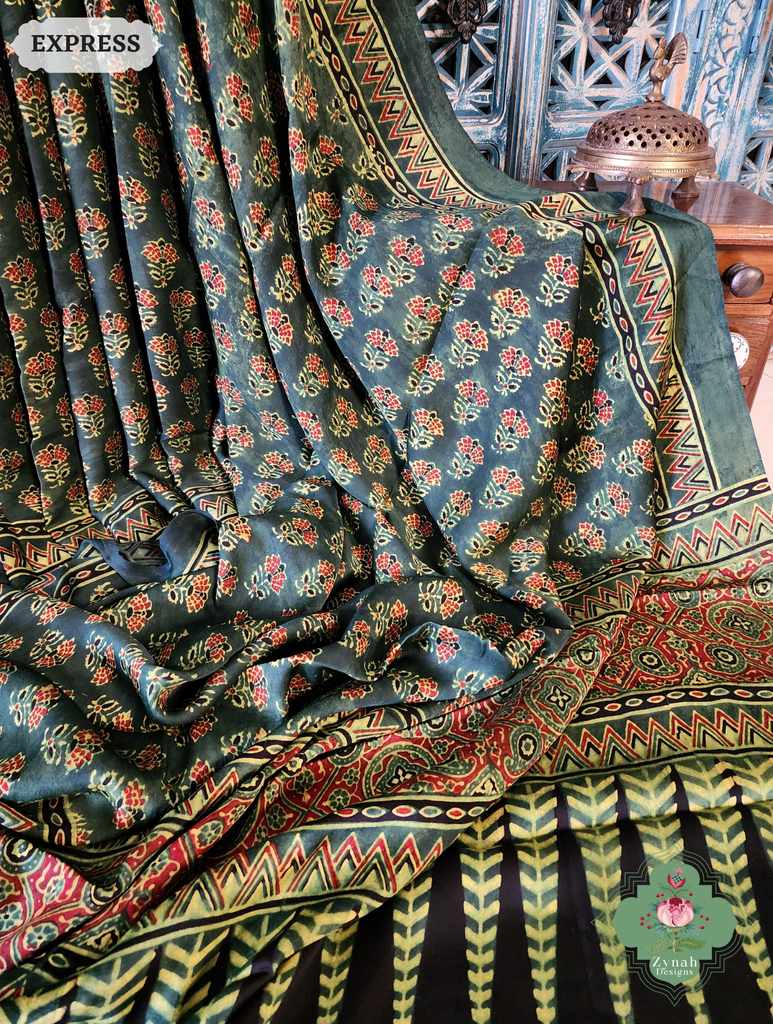 Zynah Green & Red Ajrakh Modal Silk Saree Crafted Using The Traditional Method Of Hand Block Printing Using 100% Natural Dyes; Custom Stitched/Ready-made Blouse, Fall, Petticoat; SKU: 1402202504