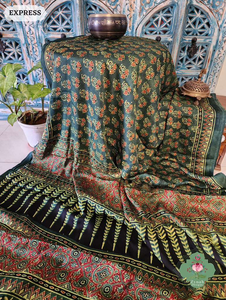 Zynah Green & Red Ajrakh Modal Silk Saree Crafted Using The Traditional Method Of Hand Block Printing Using 100% Natural Dyes; Custom Stitched/Ready-made Blouse, Fall, Petticoat; SKU: 1402202504