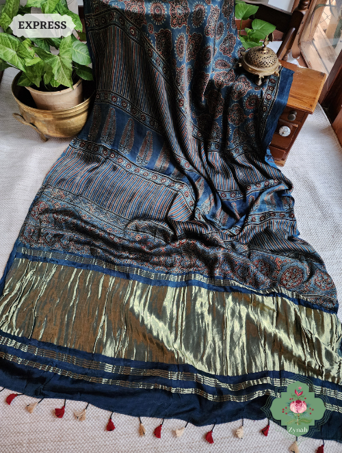 Indigo Ajrakh Modal Silk Saree With Lagdi Patta On Pallu, Crafted Using The Traditional Method Of Hand Block Printing Using 100% Natural Dyes