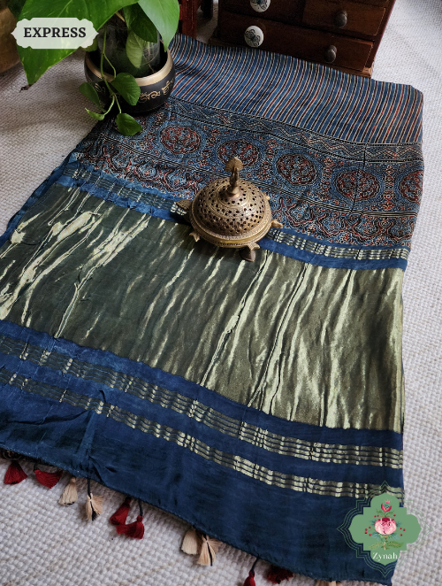 Indigo Ajrakh Modal Silk Saree With Lagdi Patta On Pallu, Crafted Using The Traditional Method Of Hand Block Printing Using 100% Natural Dyes