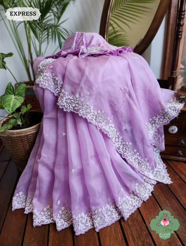 Zynah Lilac Organza Silk Saree With Pearls, Cutdana & Sequins Hand Embellishments; Custom Stitched/Ready-made Blouse, Fall, Petticoat; SKU: 2711202404
