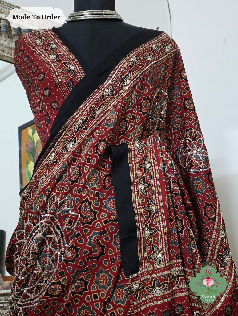 Zynah Made To Order Madder Red Ajrakh Modal Silk Saree With Lagdi Patta Pallu & Hand Embellishments; Custom Stitched/Ready-made Blouse, Fall, Petticoat; SKU:1909202510
