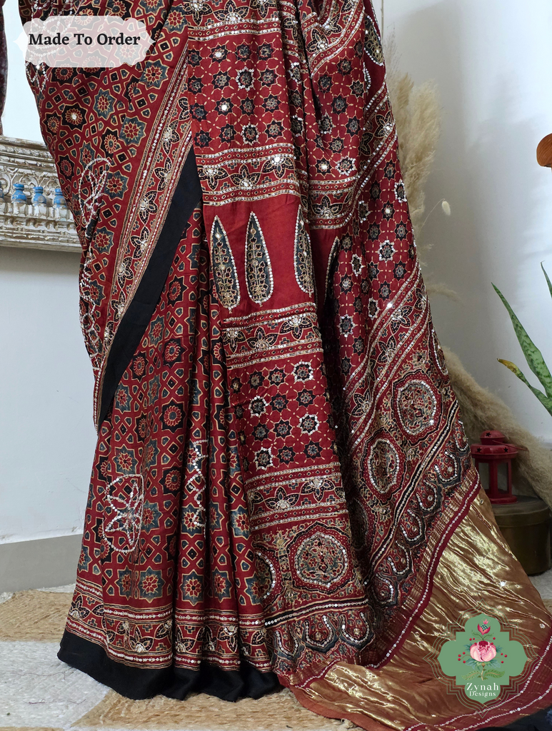 Zynah Made To Order Madder Red Ajrakh Modal Silk Saree With Lagdi Patta Pallu & Hand Embellishments; Custom Stitched/Ready-made Blouse, Fall, Petticoat; SKU:1909202510