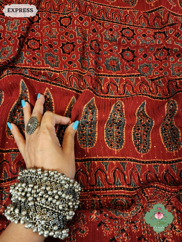 Zynah Madder Red Hand-Block Printed Georgette Silk Ajrakh Saree with Sequins Highlight; Custom Stitched/Ready-made Blouse, Fall, Petticoat; SKU: 1004202508