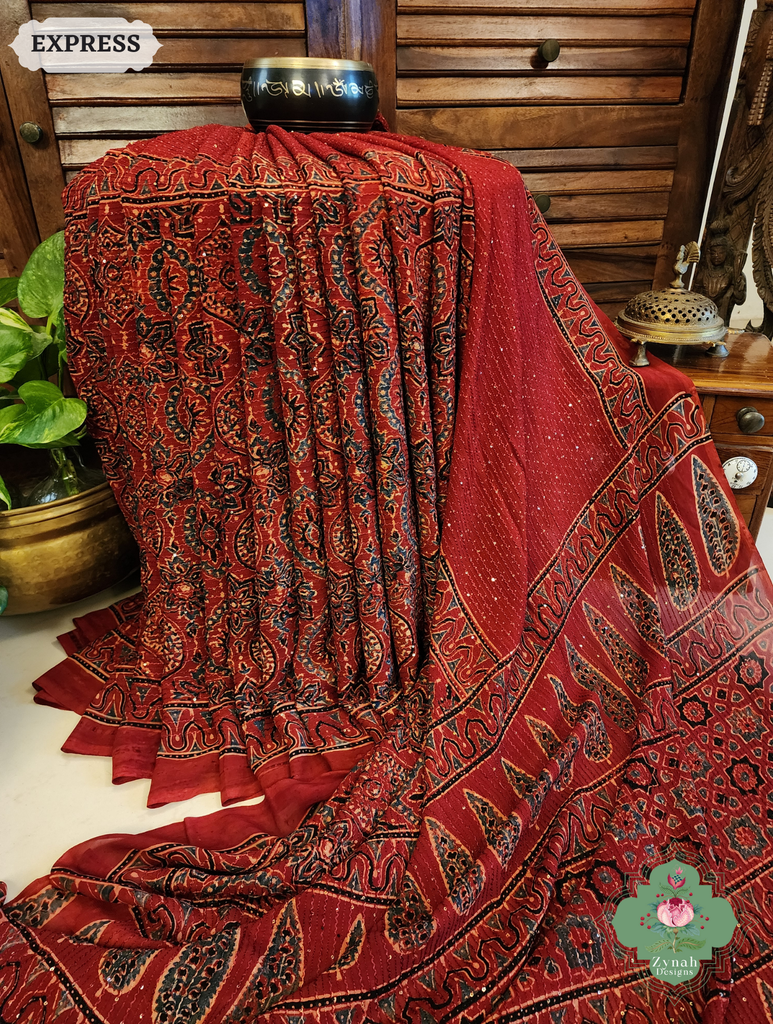 Zynah Madder Red Hand-Block Printed Georgette Silk Ajrakh Saree with Sequins Highlight; Custom Stitched/Ready-made Blouse, Fall, Petticoat; SKU: 1004202508