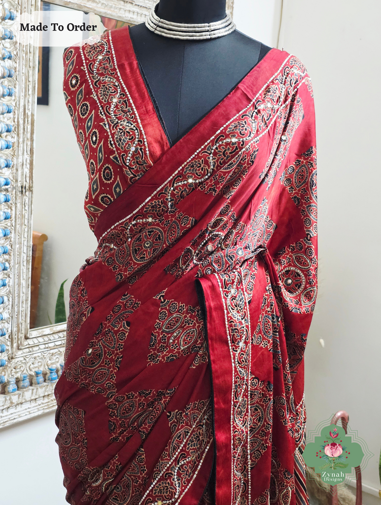 Zynah Made To Order Madder Red Ajrakh Modal Silk Saree With Hand Embellishments; Custom Stitched/Ready-made Blouse, Fall, Petticoat; SKU:1909202511