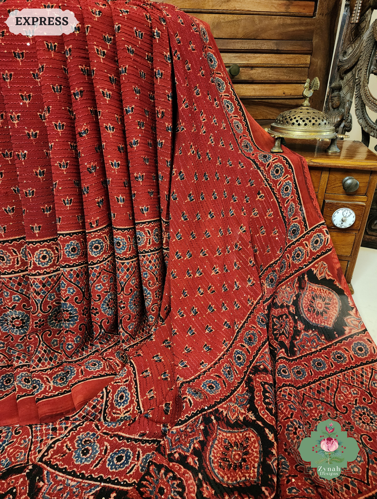 Zynah Madder Red Hand-Block Printed Georgette Silk Ajrakh Saree with Sequins Highlight; Custom Stitched/Ready-made Blouse, Fall, Petticoat; SKU: 1004202509