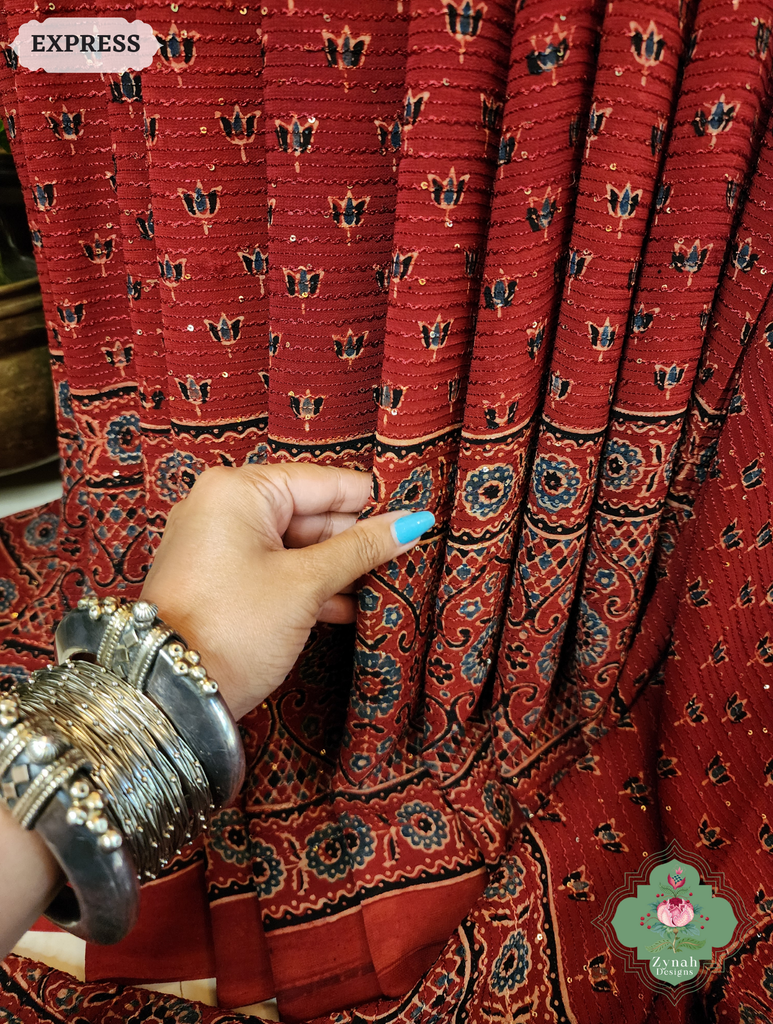 Zynah Madder Red Hand-Block Printed Georgette Silk Ajrakh Saree with Sequins Highlight; Custom Stitched/Ready-made Blouse, Fall, Petticoat; SKU: 1004202509
