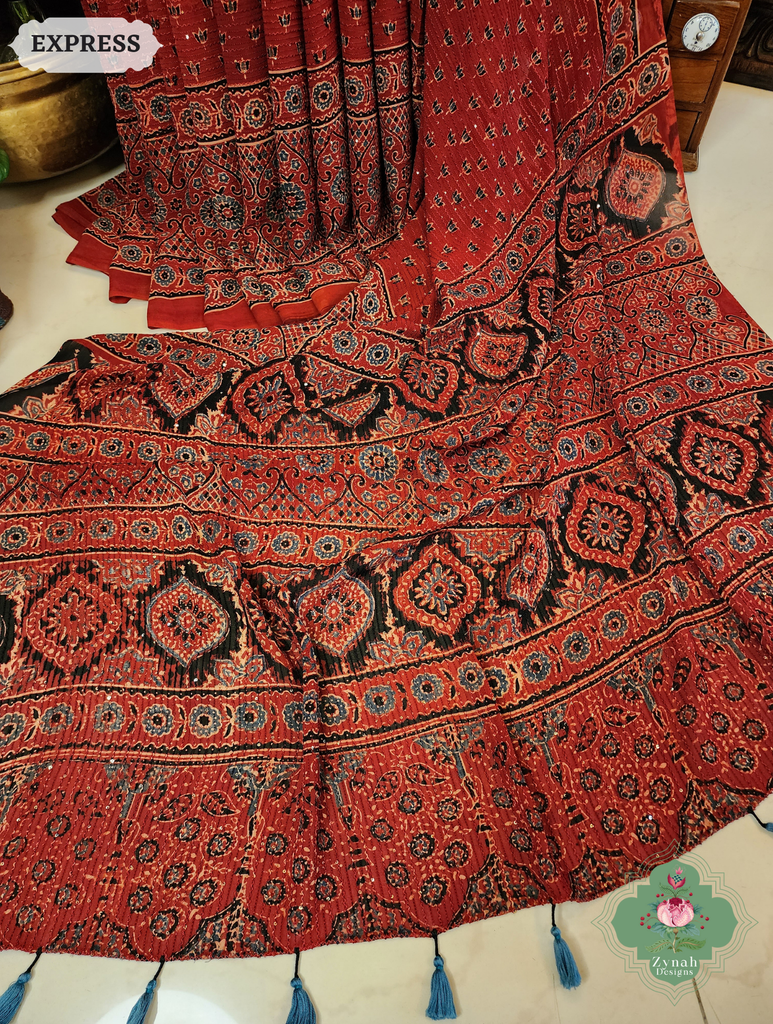 Zynah Madder Red Hand-Block Printed Georgette Silk Ajrakh Saree with Sequins Highlight; Custom Stitched/Ready-made Blouse, Fall, Petticoat; SKU: 1004202509