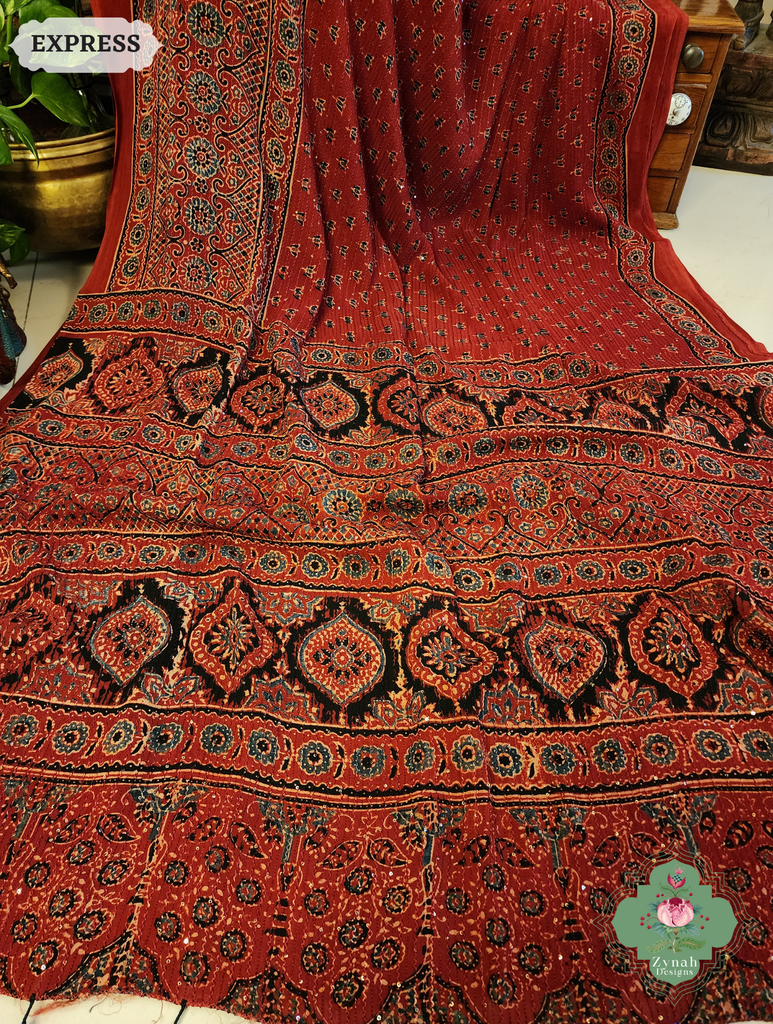 Zynah Madder Red Hand-Block Printed Georgette Silk Ajrakh Saree with Sequins Highlight; Custom Stitched/Ready-made Blouse, Fall, Petticoat; SKU: 1004202509