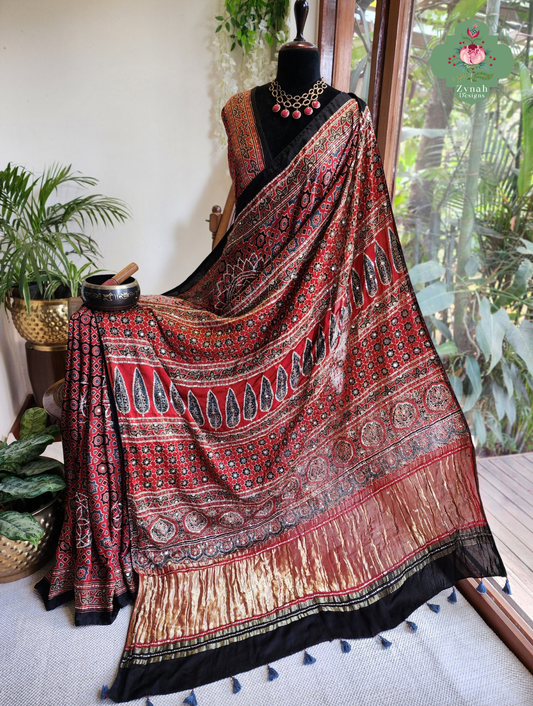 Zynah Kirmizi – Madder Red Pure Modal Silk Ajrakh Saree with Ajrakh Hand Block Printing & Artisan Adornments