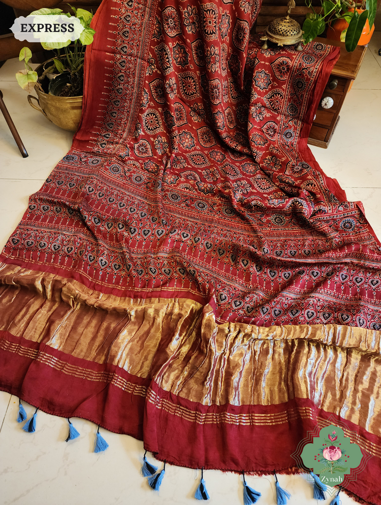 Zynah Madder Red Modal Silk Ajrakh Saree With Zari Lagdi  Patta on Pallu; Custom Stitched/Ready-made Blouse, Fall, Petticoat; SKU: 0809202302
