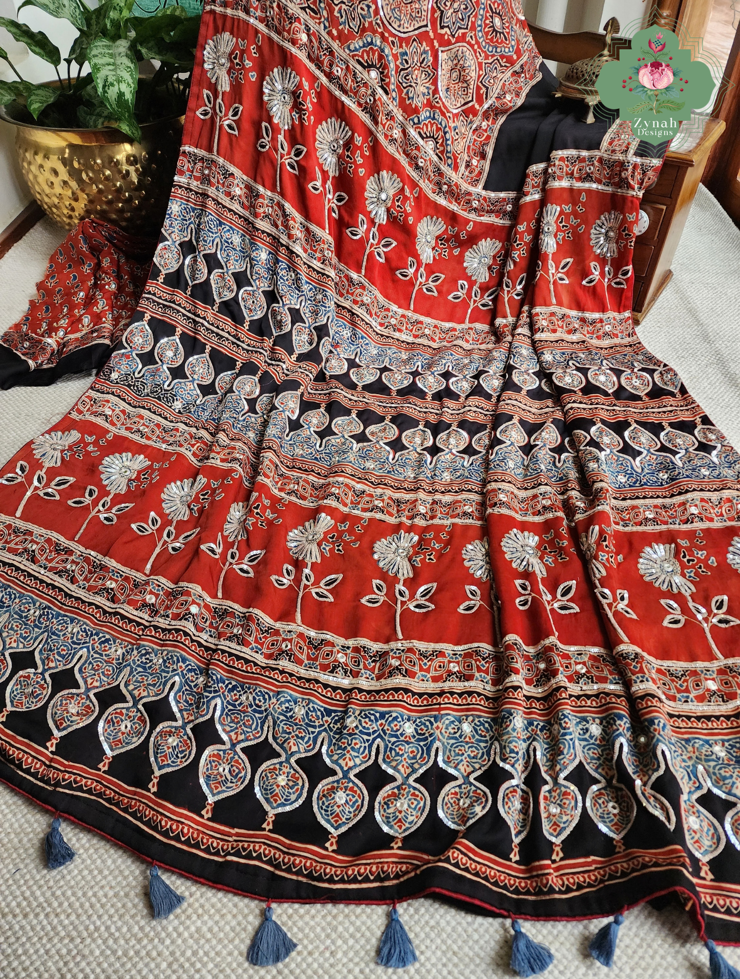 Zynah Siahra – Madder Red & Black Pure Modal Silk Ajrakh Saree with Ajrakh Hand Block Printing & Artisan Embellishments
