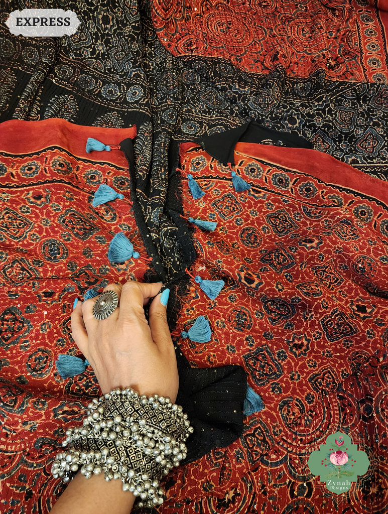 Zynah Madder Red & Black Hand-Block Printed Georgette Silk Ajrakh Saree with Sequins Highlight; Custom Stitched/Ready-made Blouse, Fall, Petticoat; SKU: 1004202503
