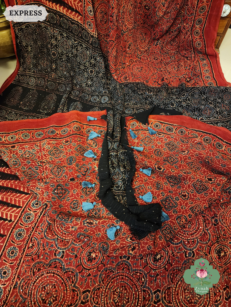 Zynah Madder Red & Black Hand-Block Printed Georgette Silk Ajrakh Saree with Sequins Highlight; Custom Stitched/Ready-made Blouse, Fall, Petticoat; SKU: 1004202503