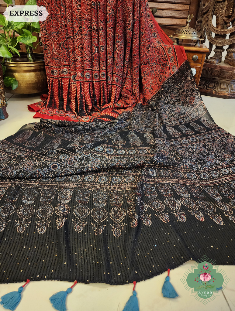 Zynah Madder Red & Black Hand-Block Printed Georgette Silk Ajrakh Saree with Sequins Highlight; Custom Stitched/Ready-made Blouse, Fall, Petticoat; SKU: 1004202503