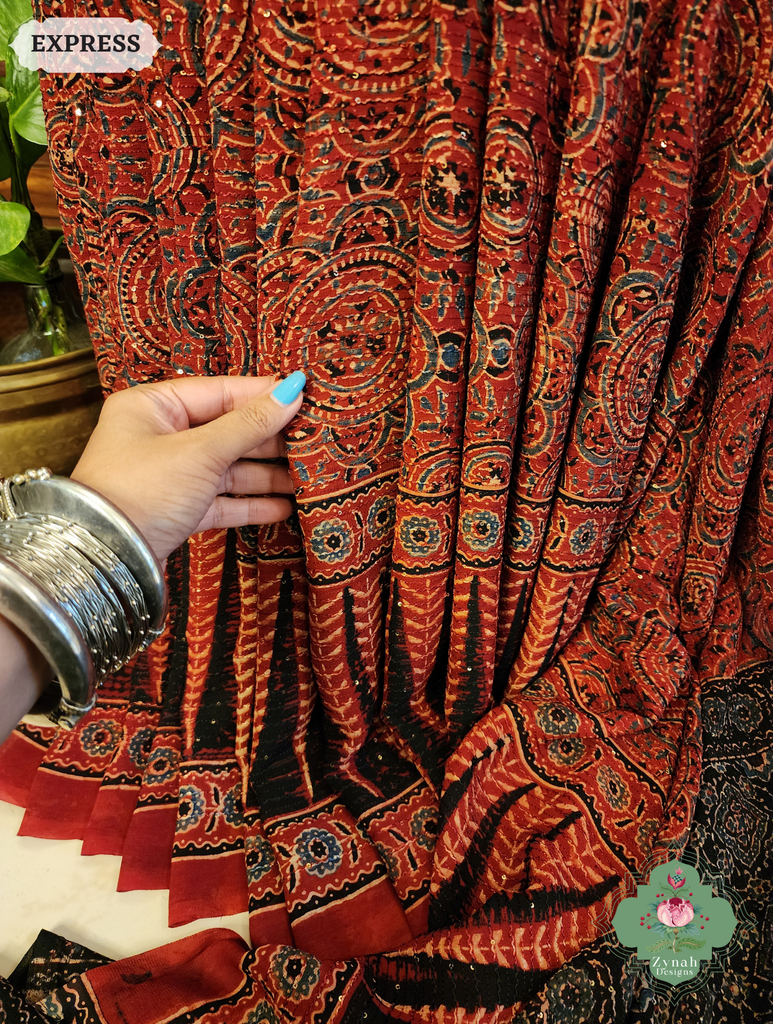 Zynah Madder Red & Black Hand-Block Printed Georgette Silk Ajrakh Saree with Sequins Highlight; Custom Stitched/Ready-made Blouse, Fall, Petticoat; SKU: 1004202503