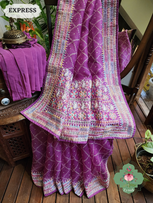 Magenta Organza Silk Saree: Bandhani prints & multi-colored embroidery. Timeless elegance and contemporary charm combined.