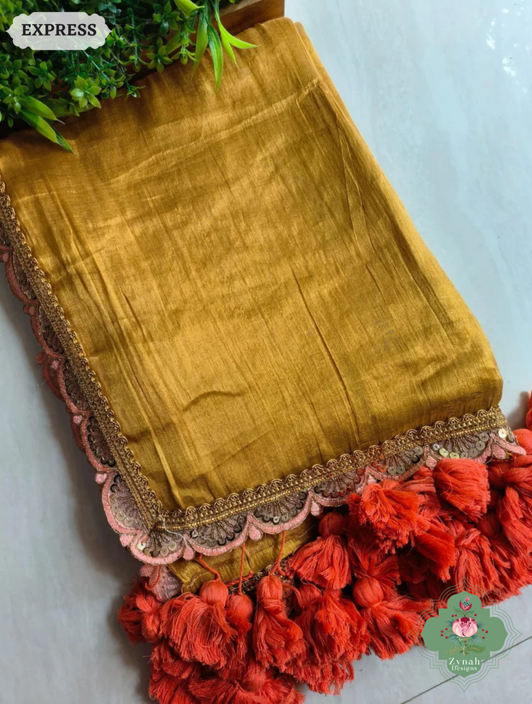 Zynah Metallic Mustard Linen Tissue Saree With Scalloped Lace & Orange Tassels; Custom Stitched/Ready-made Blouse, Fall, Petticoat; SKU: 2703202513
