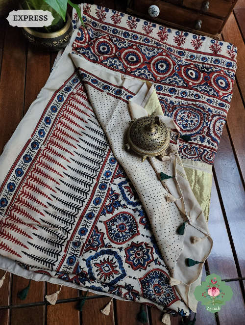 Off White Ajrakh Modal Silk Saree With Lagdi Patta On Pallu, Crafted Using The Traditional Method Of Hand Block Printing Using 100% Natural Dyes