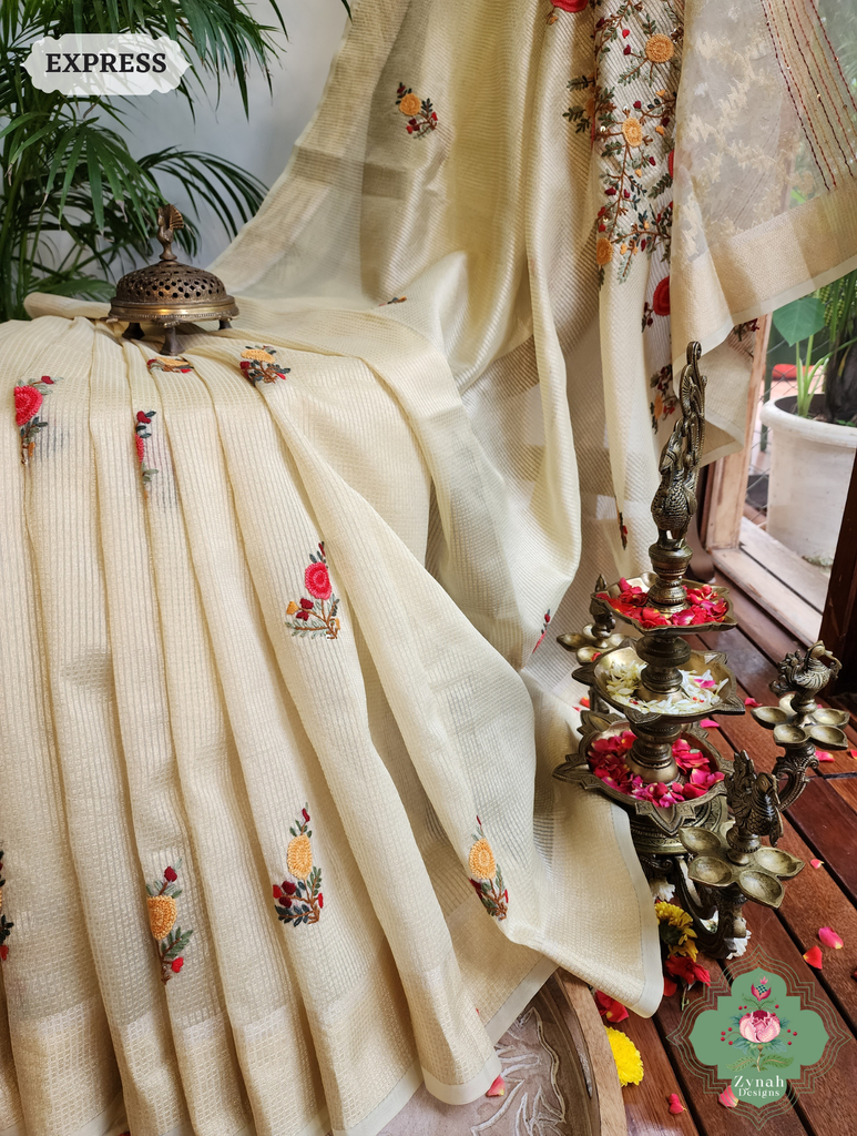 Zynah Off White Kota Tissue Saree With Golden Check, Jamdani Weaving Organza Pallu & Frenchknot Hand Embroidery; Custom Stitched/Ready-made Blouse, Fall, Petticoat; SKU: 1209202401