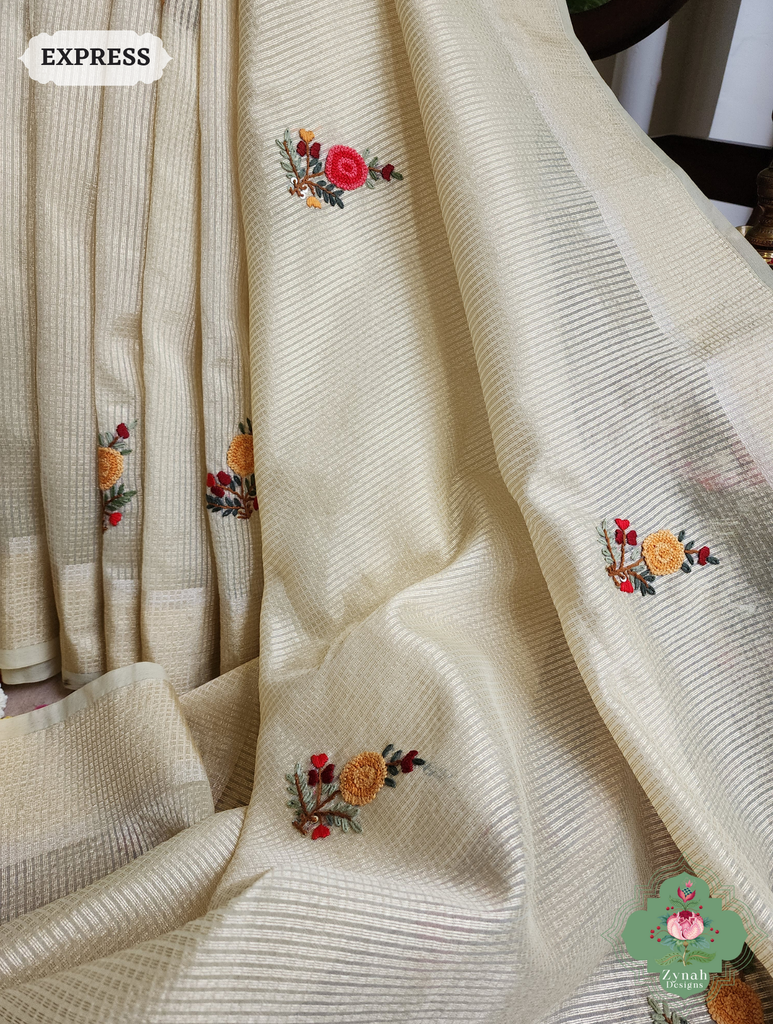 Zynah Off White Kota Tissue Saree With Golden Check, Jamdani Weaving Organza Pallu & Frenchknot Hand Embroidery; Custom Stitched/Ready-made Blouse, Fall, Petticoat; SKU: 1209202401